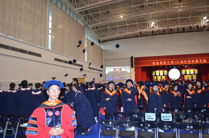 Behind-the-scenes moments from the graduation ceremony.(Open new window/jpg file)Image