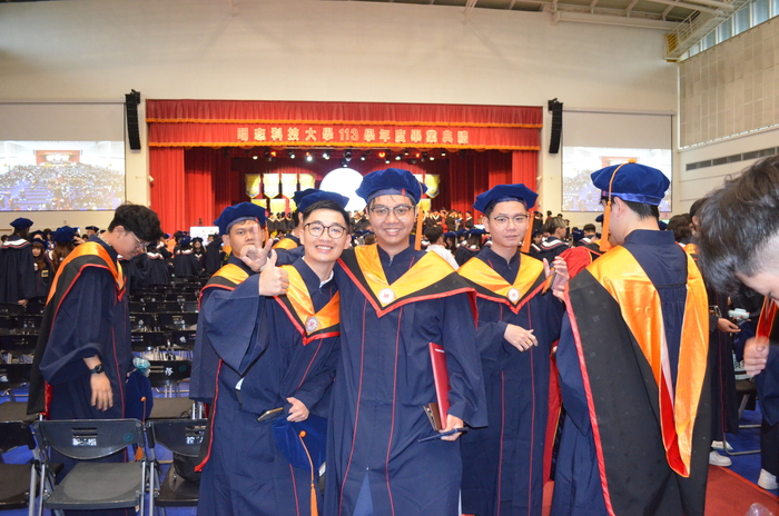 Behind-the-scenes moments from the graduation ceremony.(Open new window/jpg file)Image