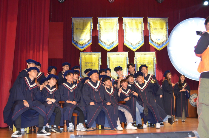 Behind-the-scenes moments from the graduation ceremony.(Open new window/jpg file)Image
