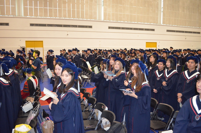Behind-the-scenes moments from the graduation ceremony.(Open new window/jpg file)Image